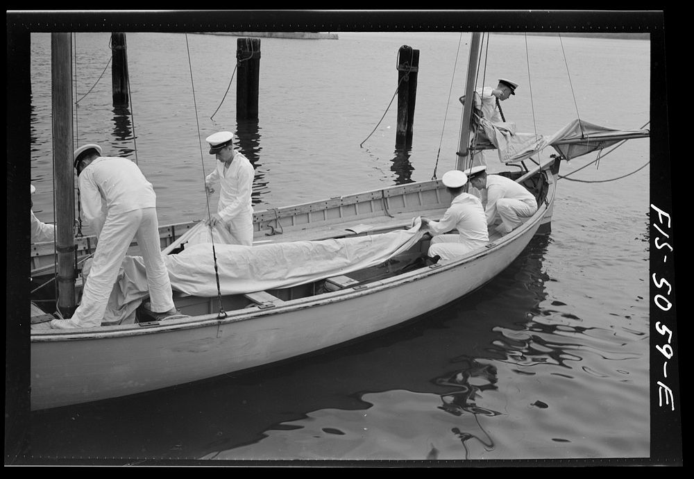 U.S. Naval Academy, Annapolis, Maryland. Getting ready for a start in a "knockabout". Sourced from the Library of Congress.