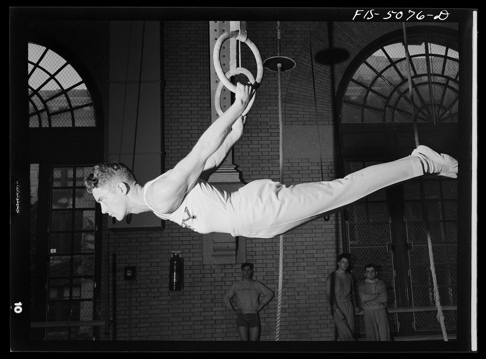 U.S. Naval Academy, Annapolis, Maryland. Gymnast on the flying rings. Sourced from the Library of Congress.