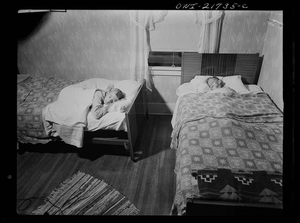 Rochester, New York. The two Babcock boys share one room. Sourced from the Library of Congress.