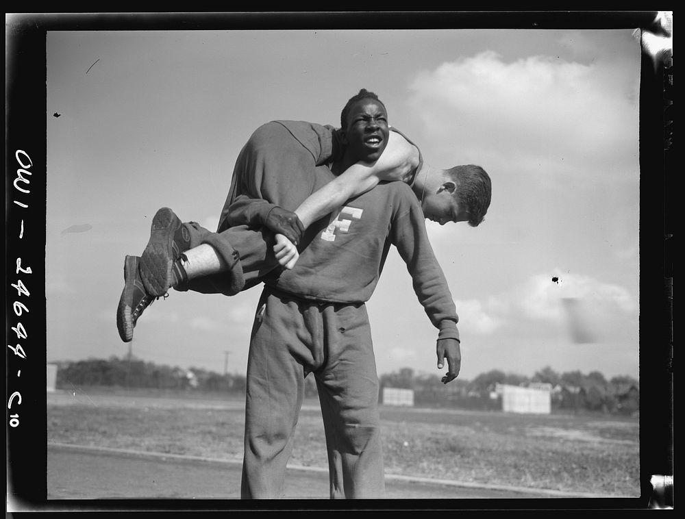 Benjamin Franklin High School, New York, New York. Boys in the "commando" course, part of the physical education program…
