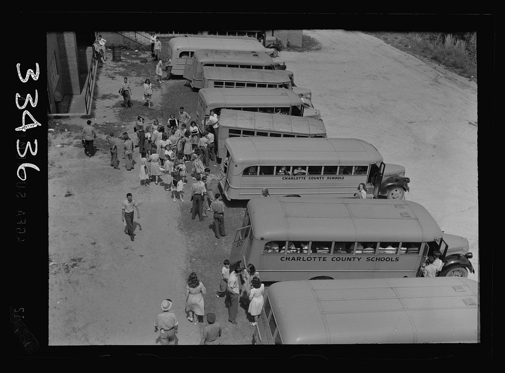 [Untitled photo, possibly related to: Keysville, Virginia. Randolph Henry High School. Buses bring children from miles…