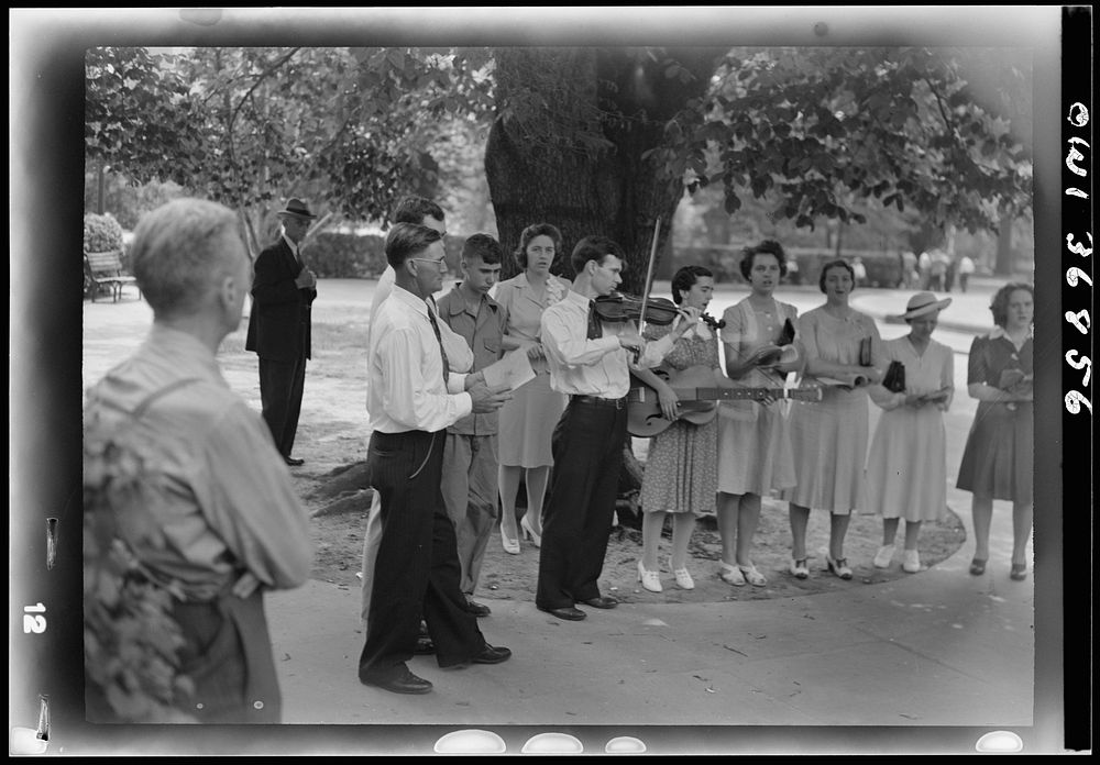 Washington, D. C. A group from the Bethel Pentecostal Tabernacle holding a service in Franklin Park on a Sunday afternoon.…