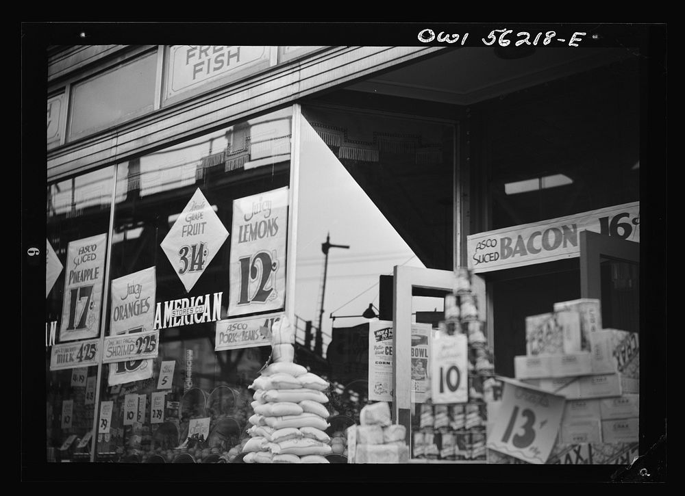 Philadelphia, Pennsylvania. Window of a chain grocery store on Market Street in West Philadelphia. Sourced from the Library…