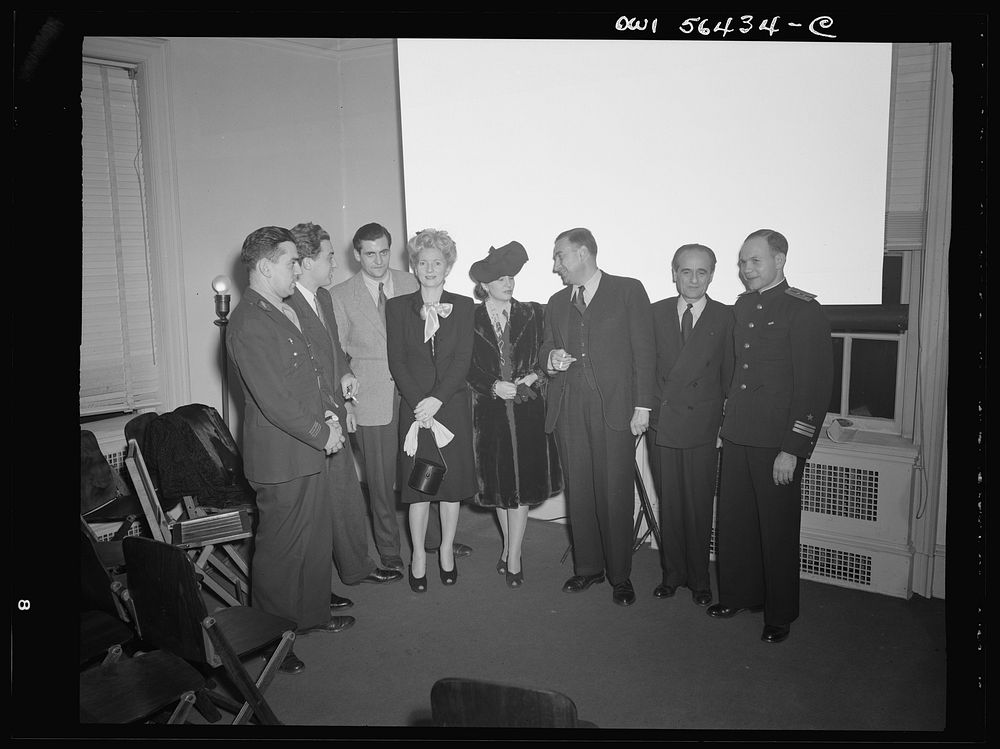 Washington, D.C. Group attending the showing of a film on S.S. Normandie at the United Nations Club. Left to right: Captain…
