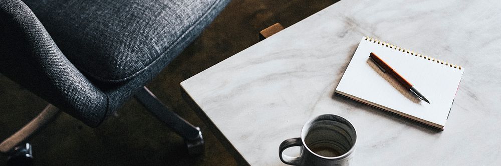 Blue cup on a white marble table