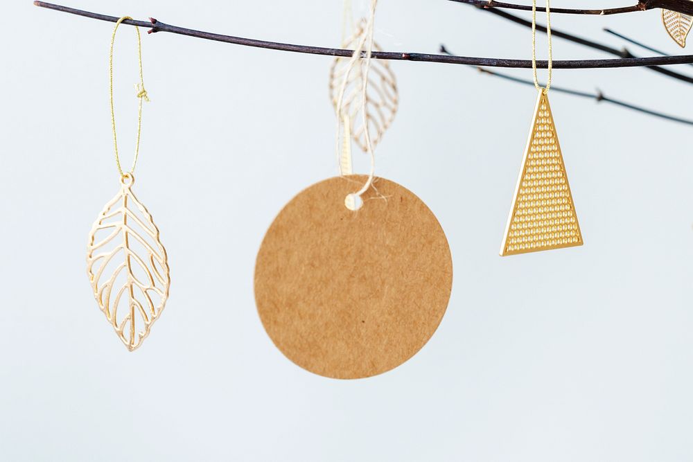Festive golden Christmas ornaments on a branch