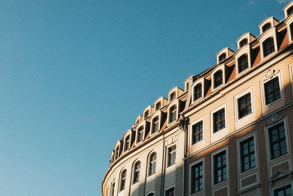 Classic European apartment building under the blue sky