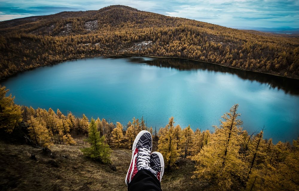 Lake surrounded by trees landscape, free public domain CC0 photo.