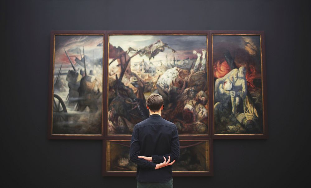 Man looking at painting, free public domain CC0 photo