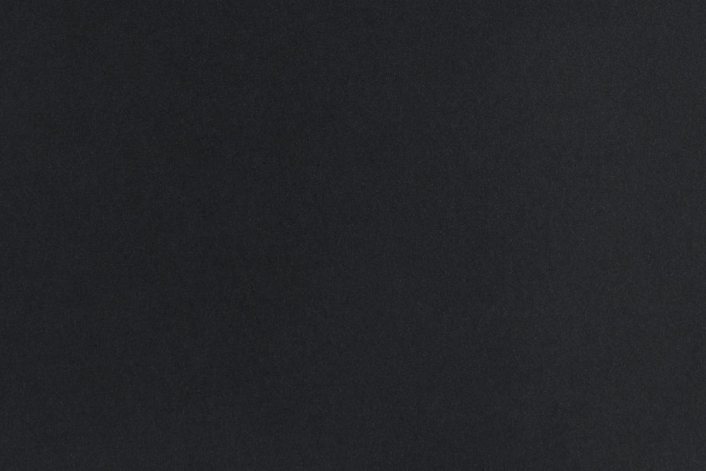 Black paper textured background