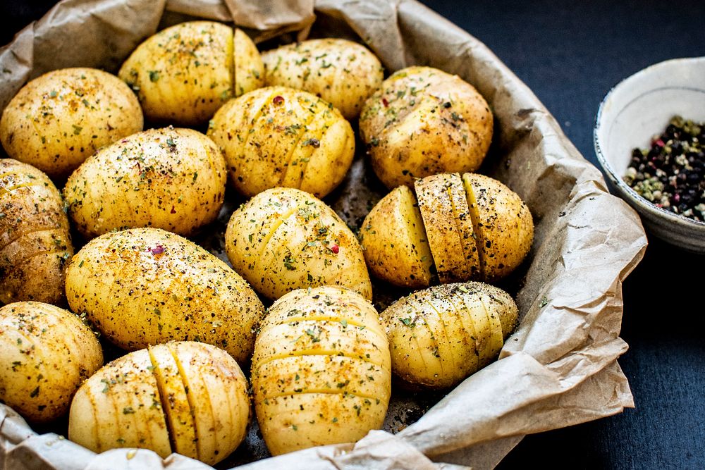 Homemade seasoned baked potatoes. Visit Monika Grabkowska to see more of her food photography.