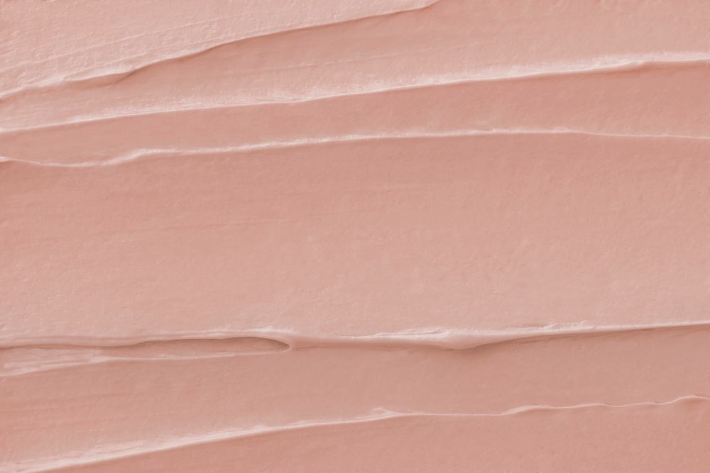 Pink frosting texture background close-up