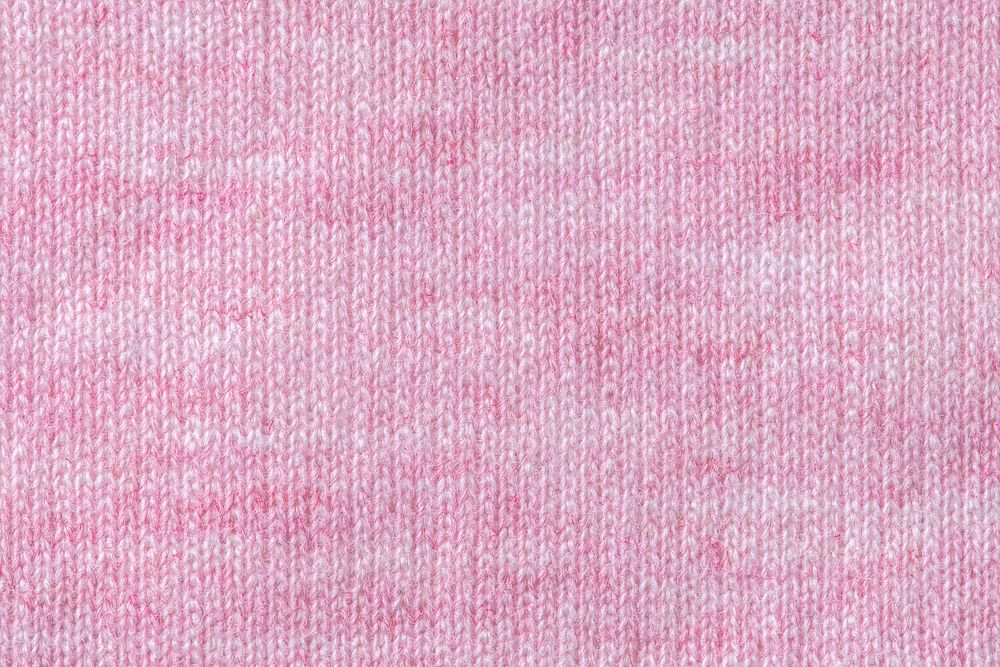 Pink background, knitted fabric texture, macro shot design