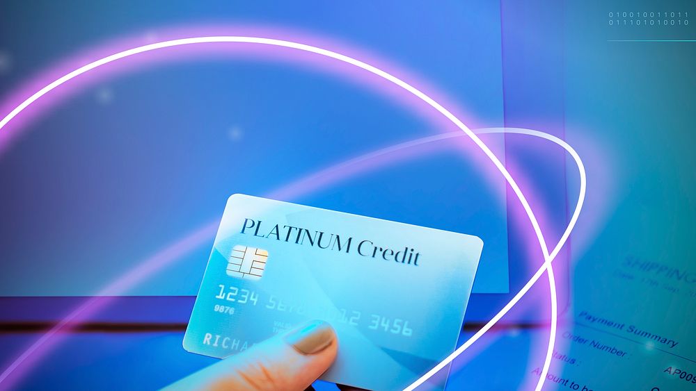 Woman holding a platinum credit card