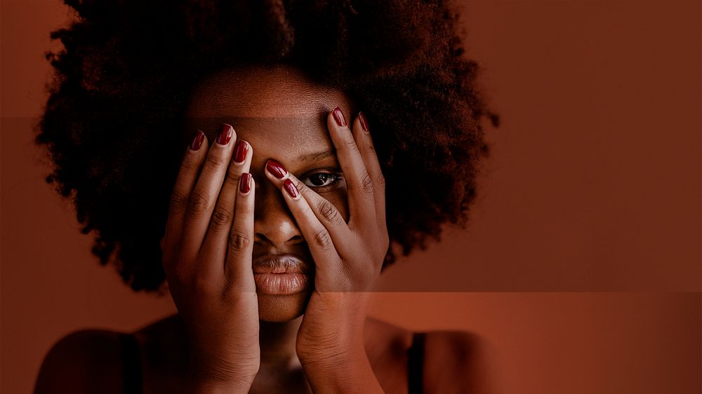 Black woman with afro hair covering her face with hands social template