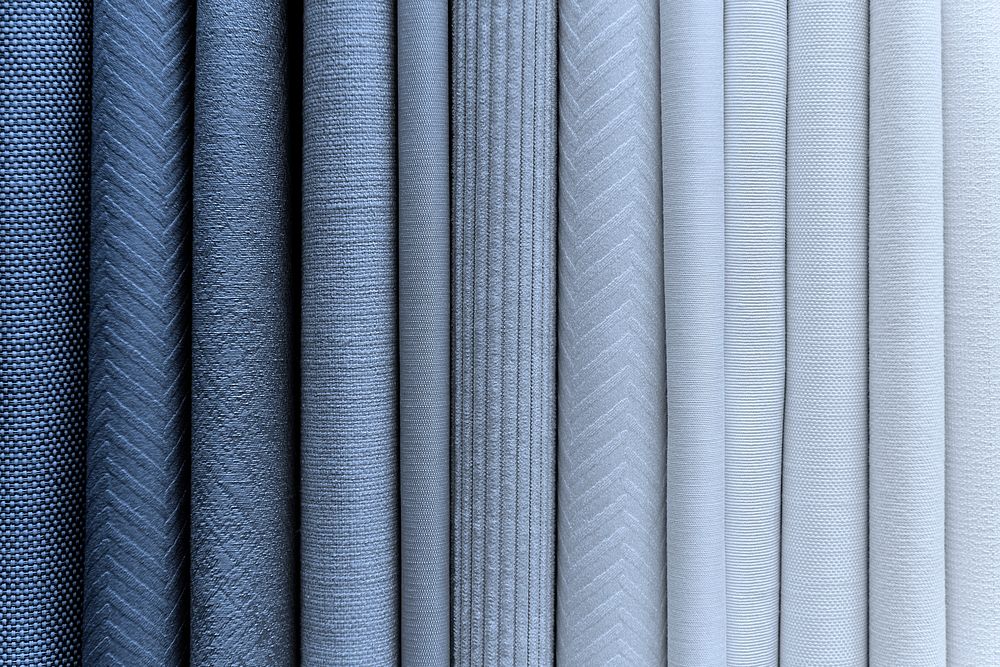 Blueish fabric stacks textured background