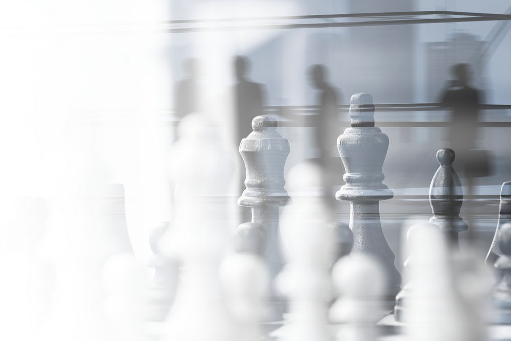 Chess strategic business plan on businesspeople background