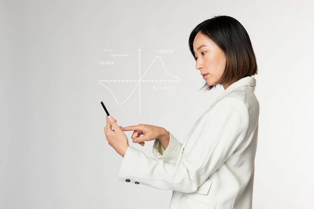 Futuristic digital presentation by a businesswoman in white