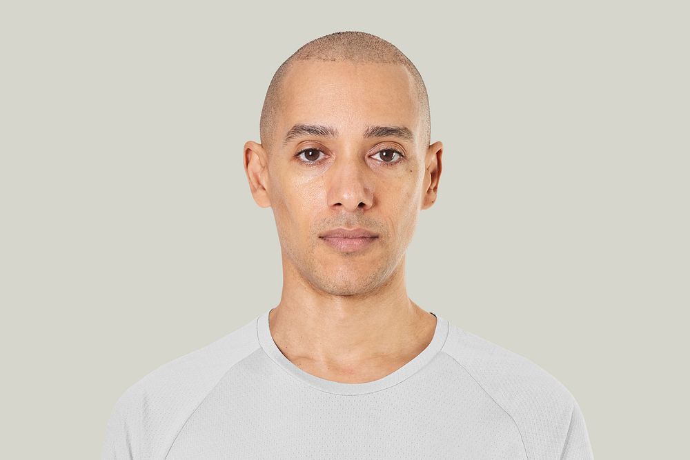 Mixed race man closeup portrait on green background