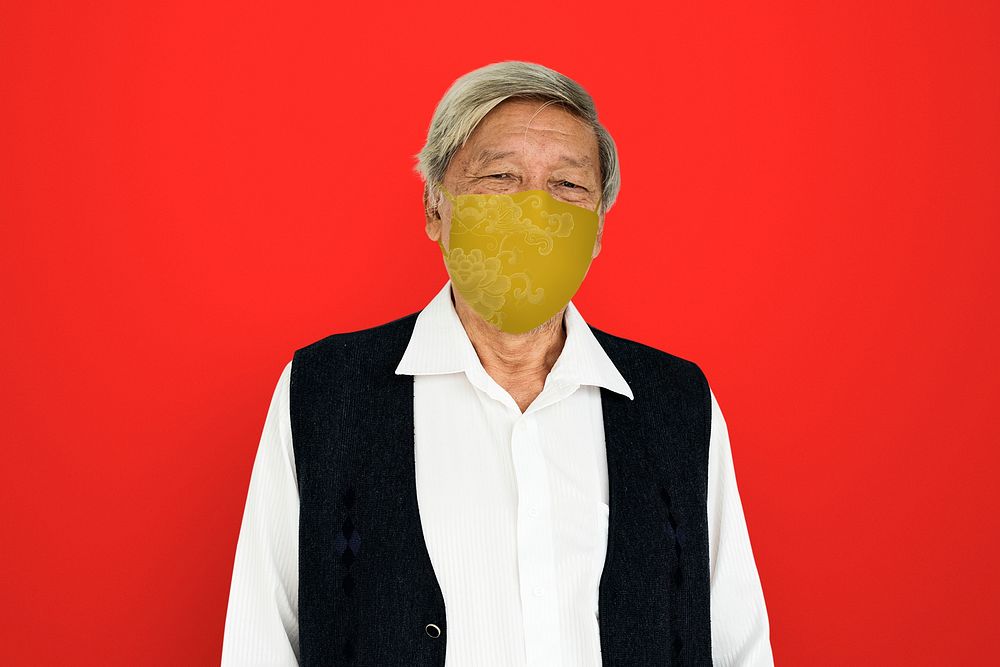 Senior man wearing face mask to prevent Covid 19
