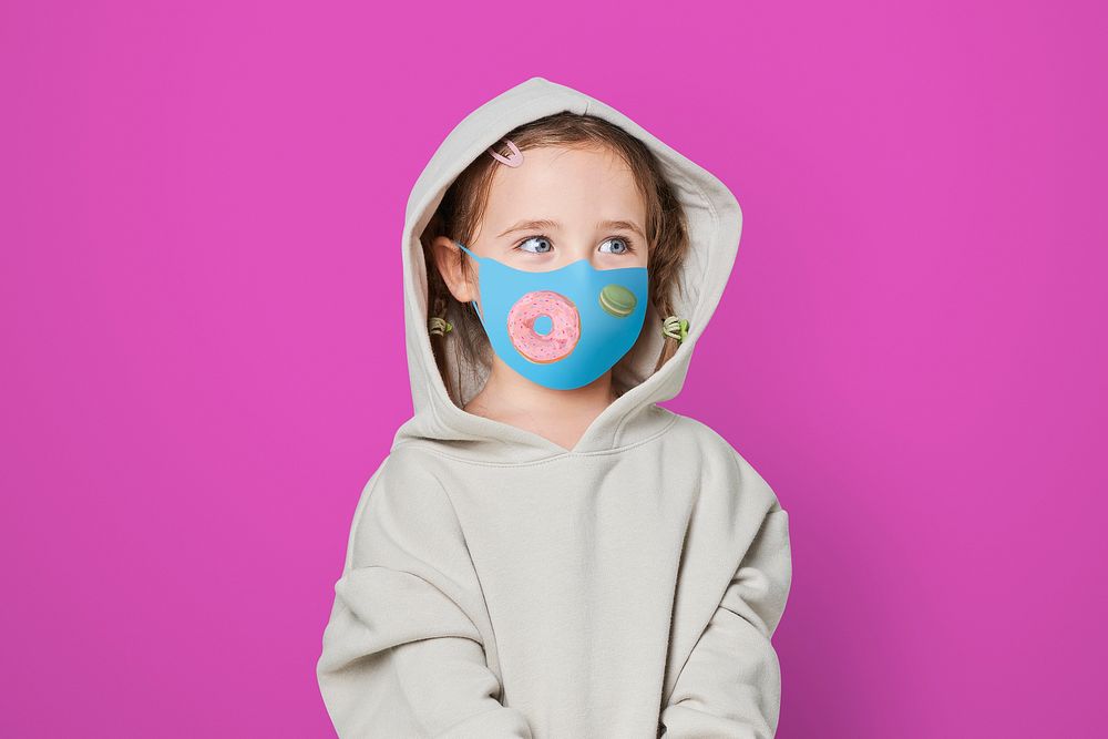 Girl  wearing face mask to prevent Covid 19