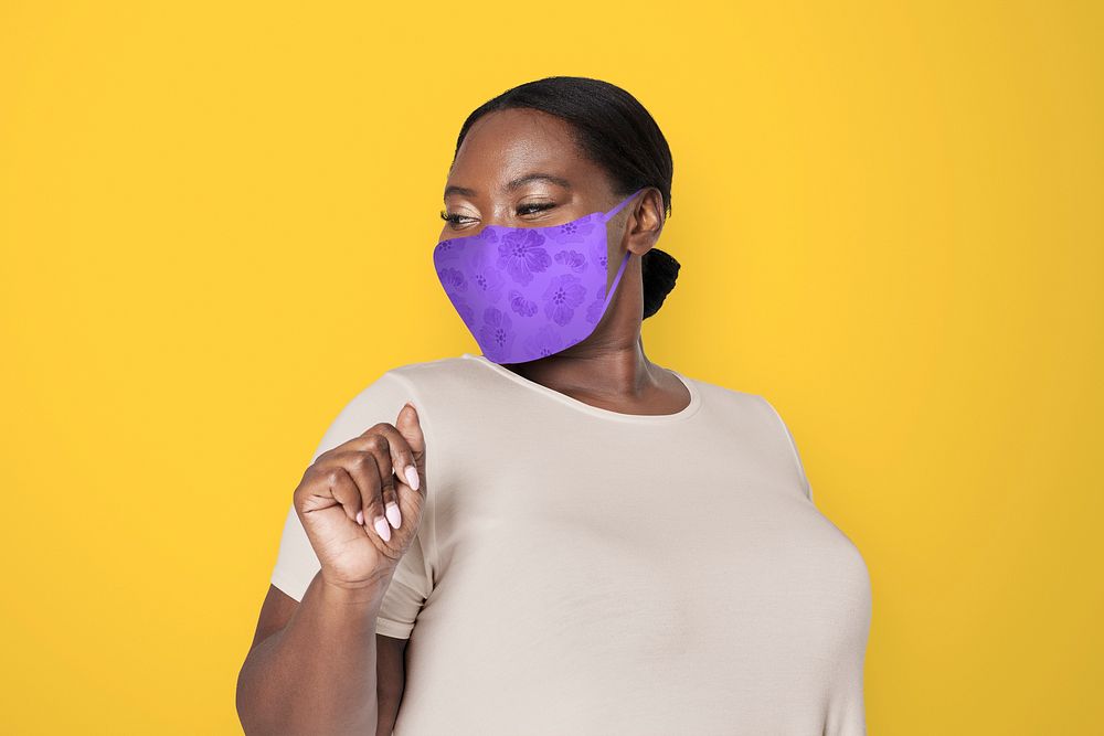 African American woman wearing face mask to prevent Covid 19