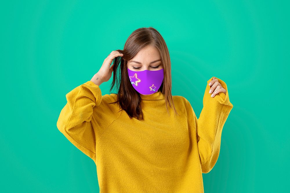 Girl wearing face mask to prevent Covid 19