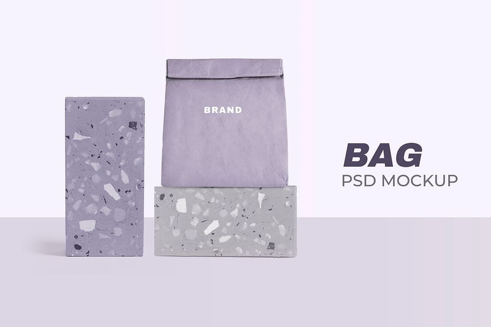 Reusable paper bag mockup psd rolled up in terrazzo pattern