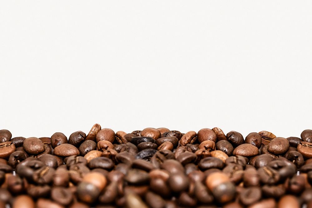 Coffee beans border, beige background