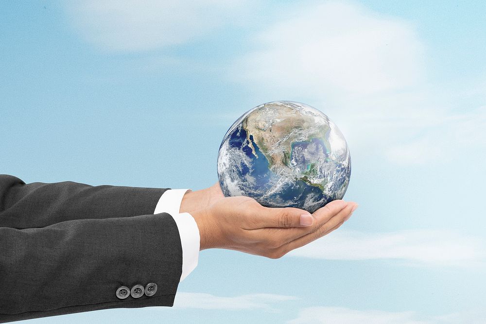 Global business, businessman holding Earth background