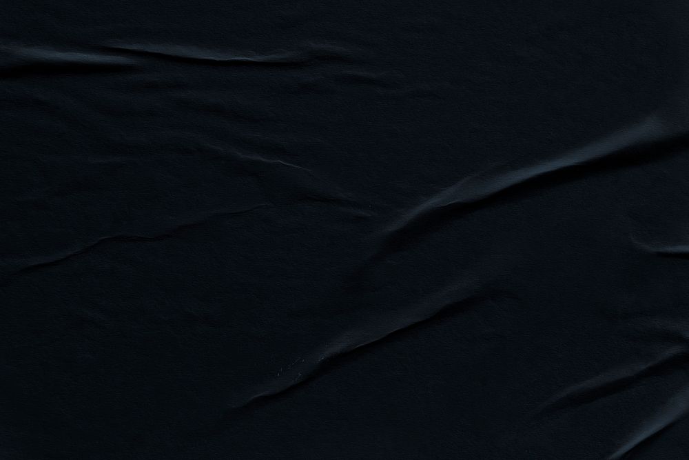 Wrinkled black paper background, simple design 