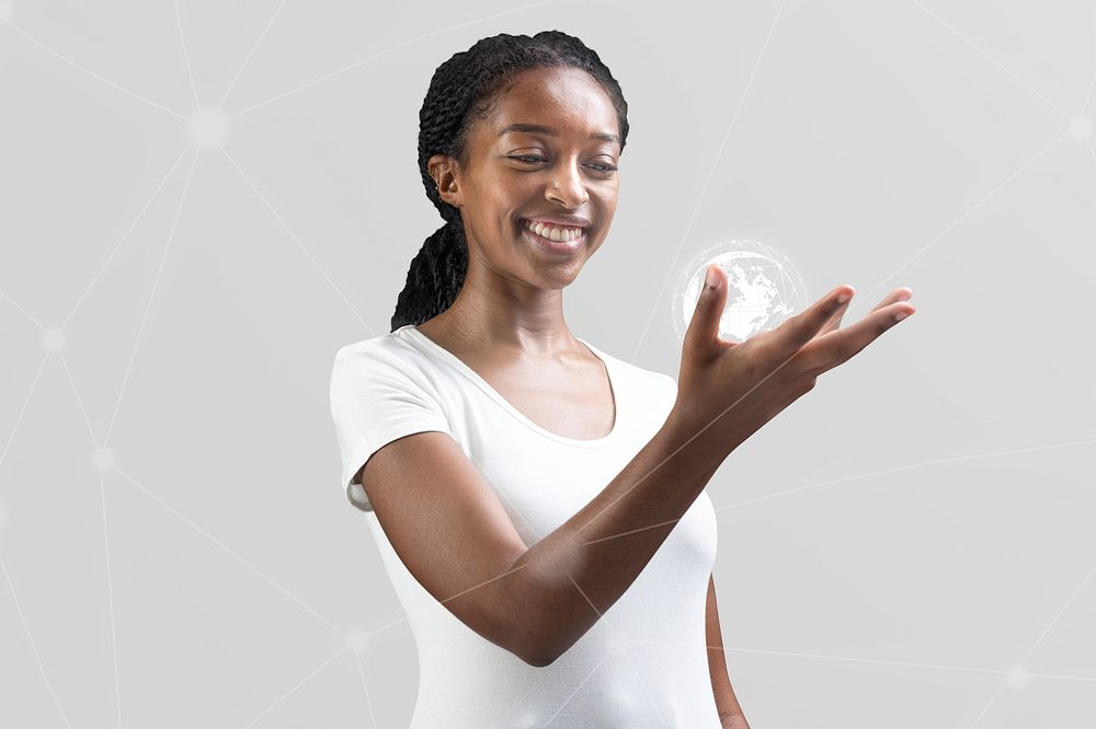 Woman with hologram globe on hand