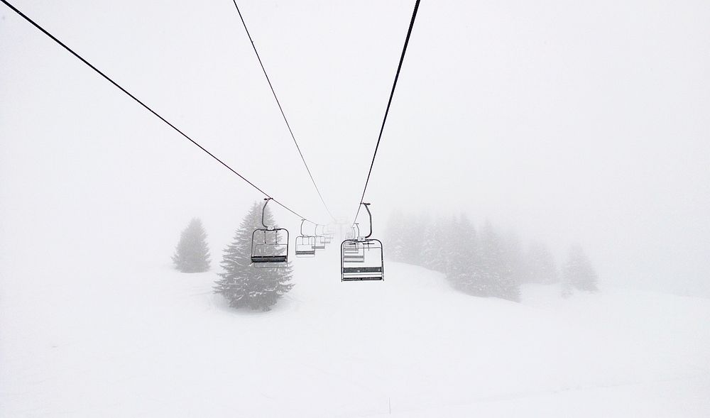 Ski lifts in a snowy resort. Original public domain image from Wikimedia Commons