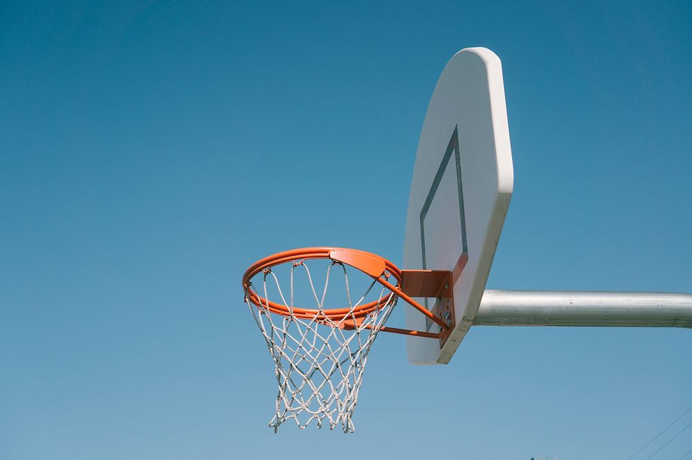 A basic photo of an outdoor basketball net, rim and backboard. Original public domain image from Wikimedia Commons