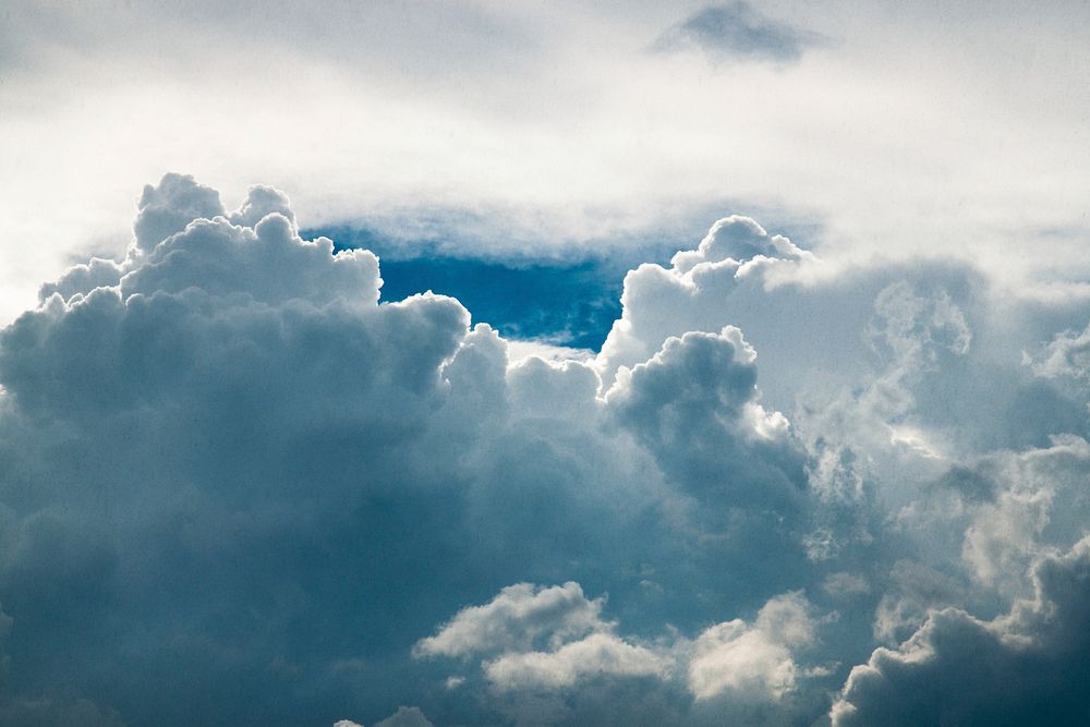 Fluffy clouds. Original public domain image from Wikimedia Commons