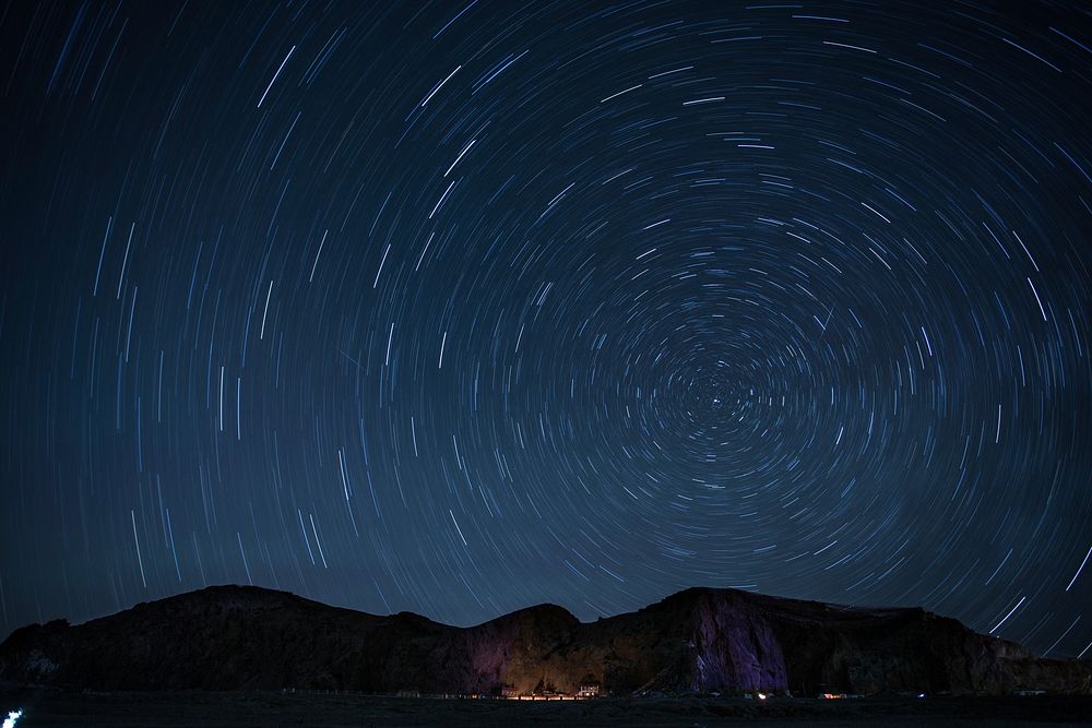 Timelapse photo of the night sky. Original public domain image from Wikimedia Commons