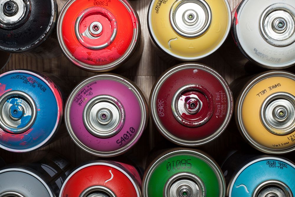 Colorful spray cans. Original public domain image from Wikimedia Commons
