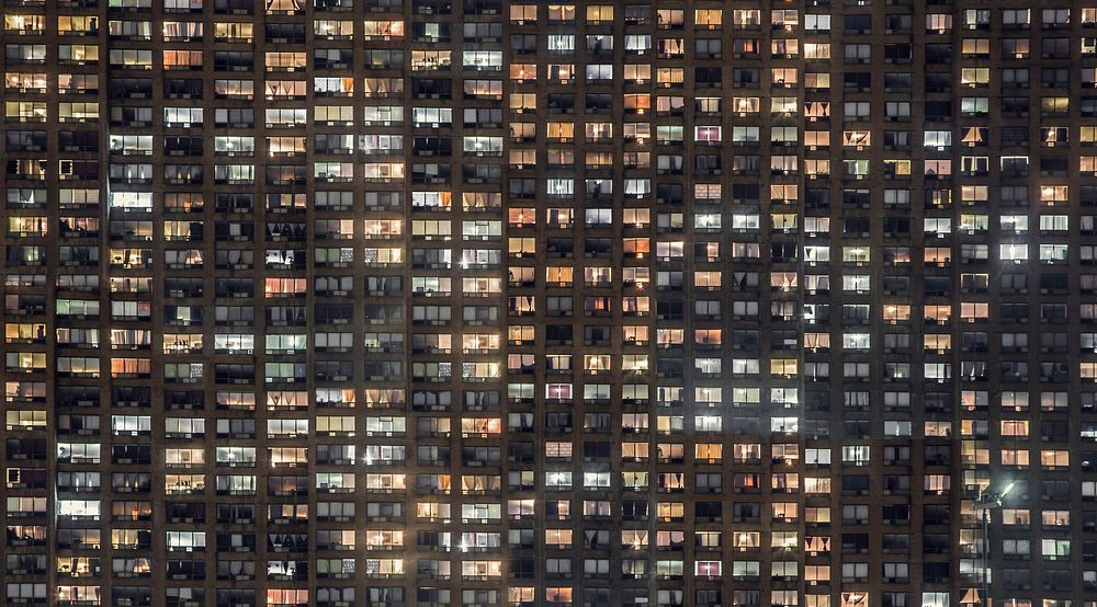 High Rise Building Window Front at Night. Original public domain image from Wikimedia Commons