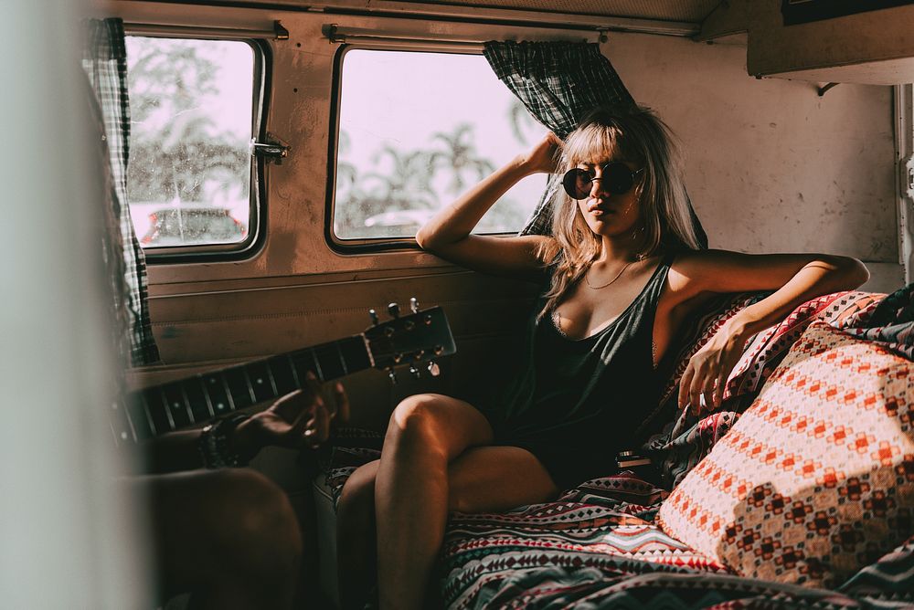 Aesthetic woman road trip portrait, travel influencer in a van