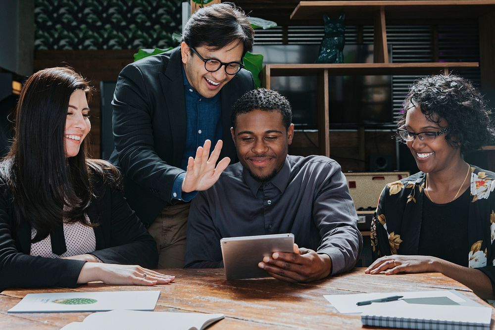 Happy businesspeople in a meeting room