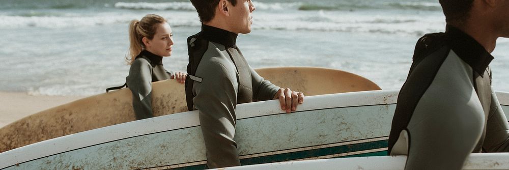 Surfers at the beach on a sunny day