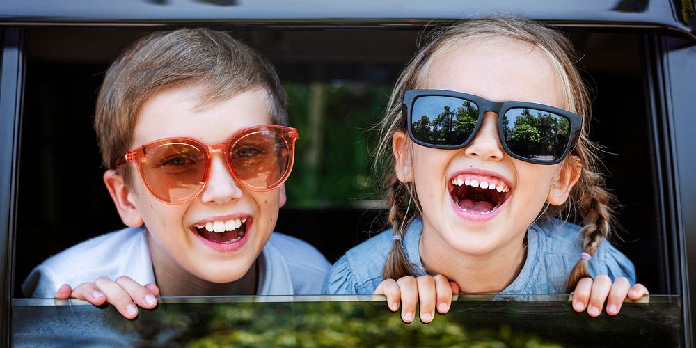 Cute kids with big sunglasses and big smiles