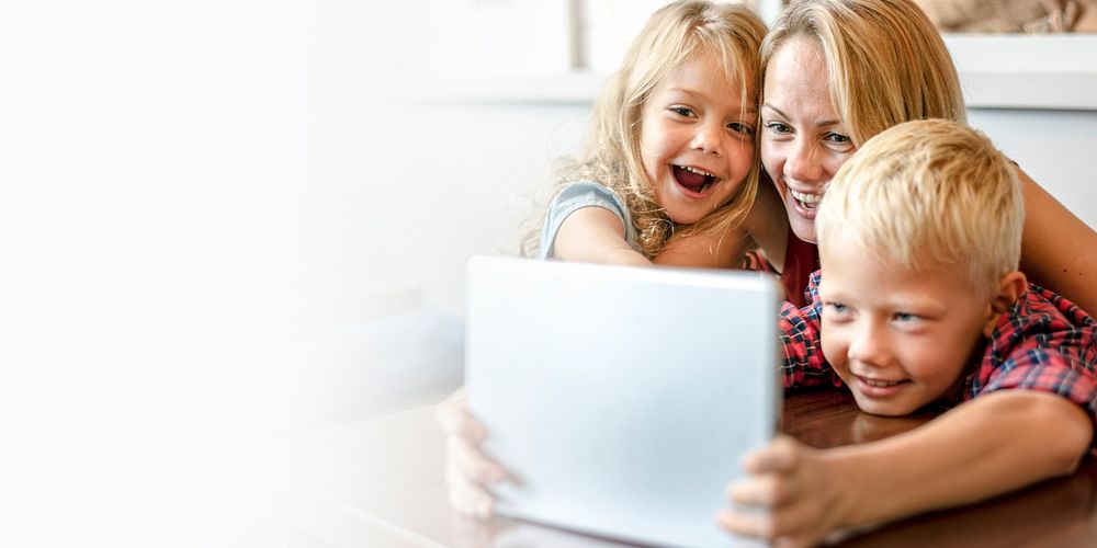 Blonde mom and kids making a video call on a tablet design space banner 