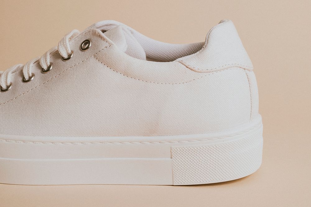 Woman's white canvas sneaker psd