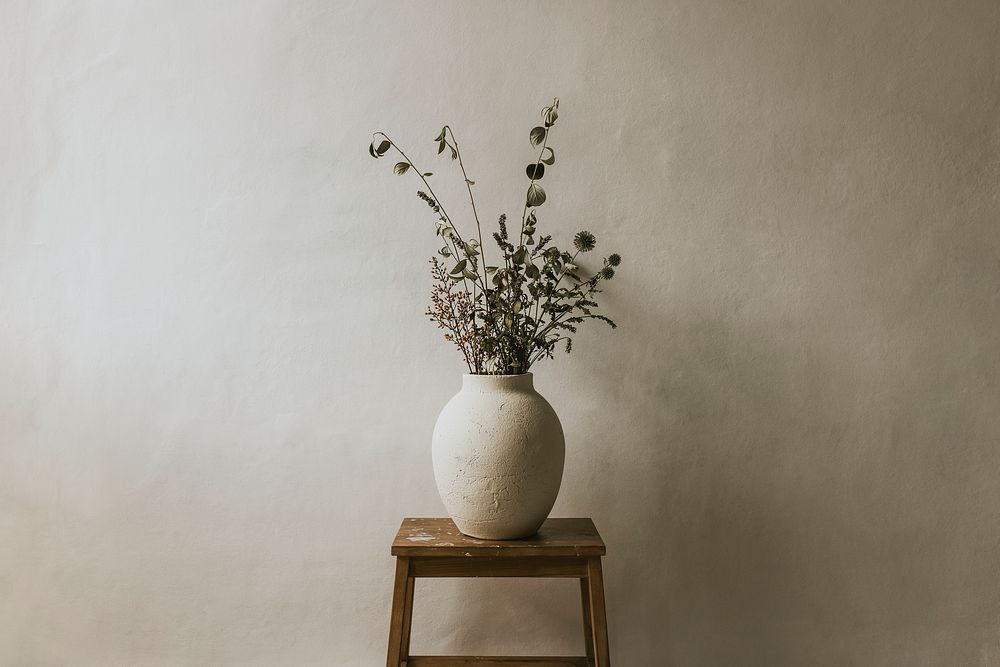Beige aesthetic flowers in vase background