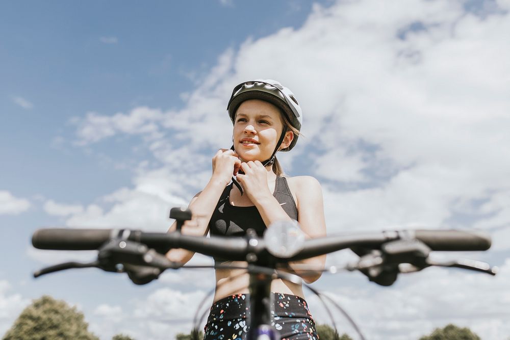 Kids background, girl riding a bike, family photo