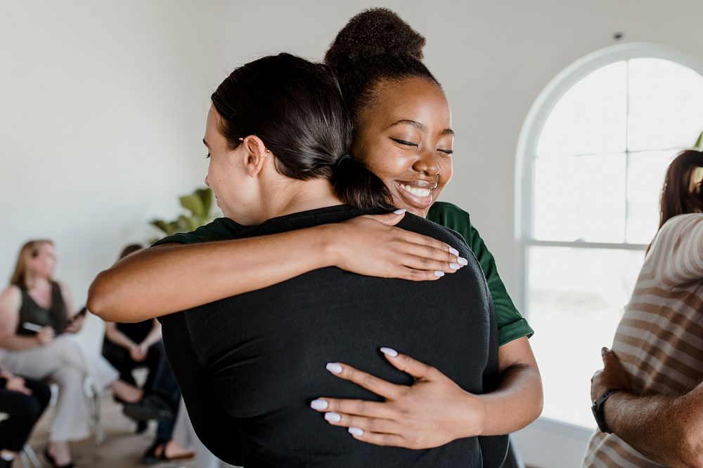 Diverse people in a supporting group session