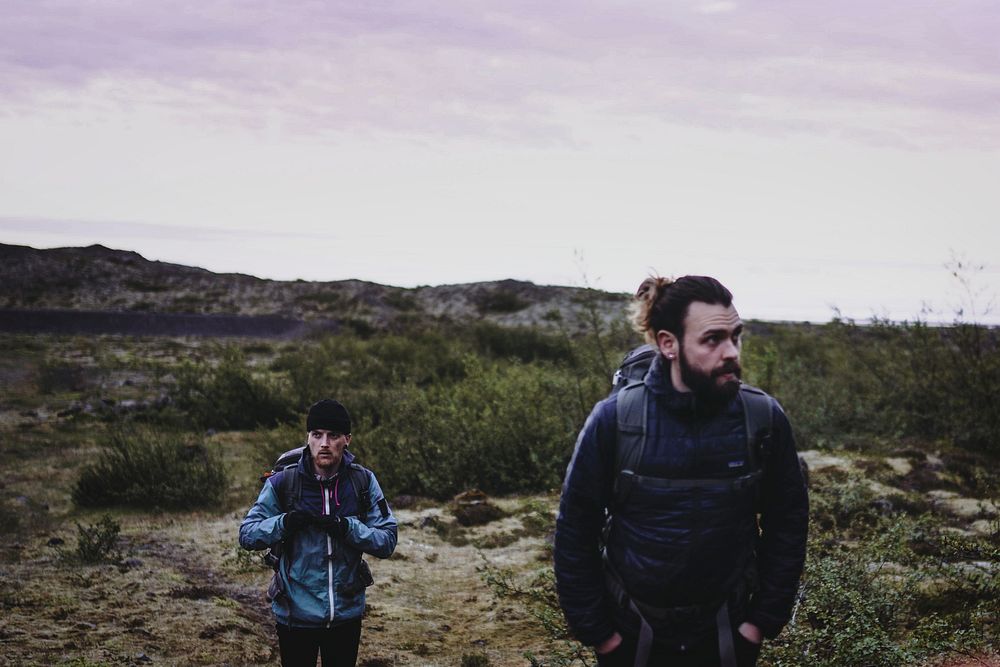 Men hiking at the South Coast of Iceland