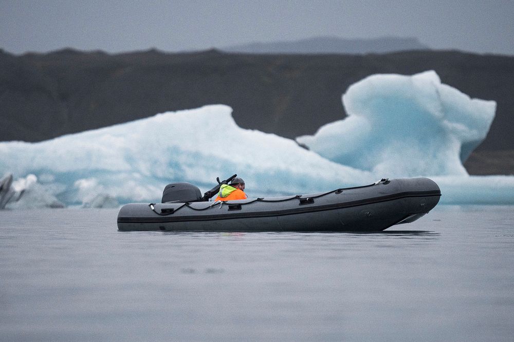Boat in a glacial lagoon, southeastern Iceland