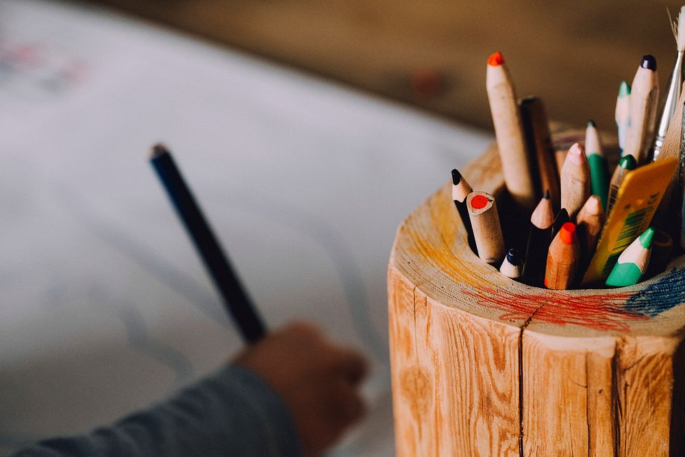 Wooden container with color pencils